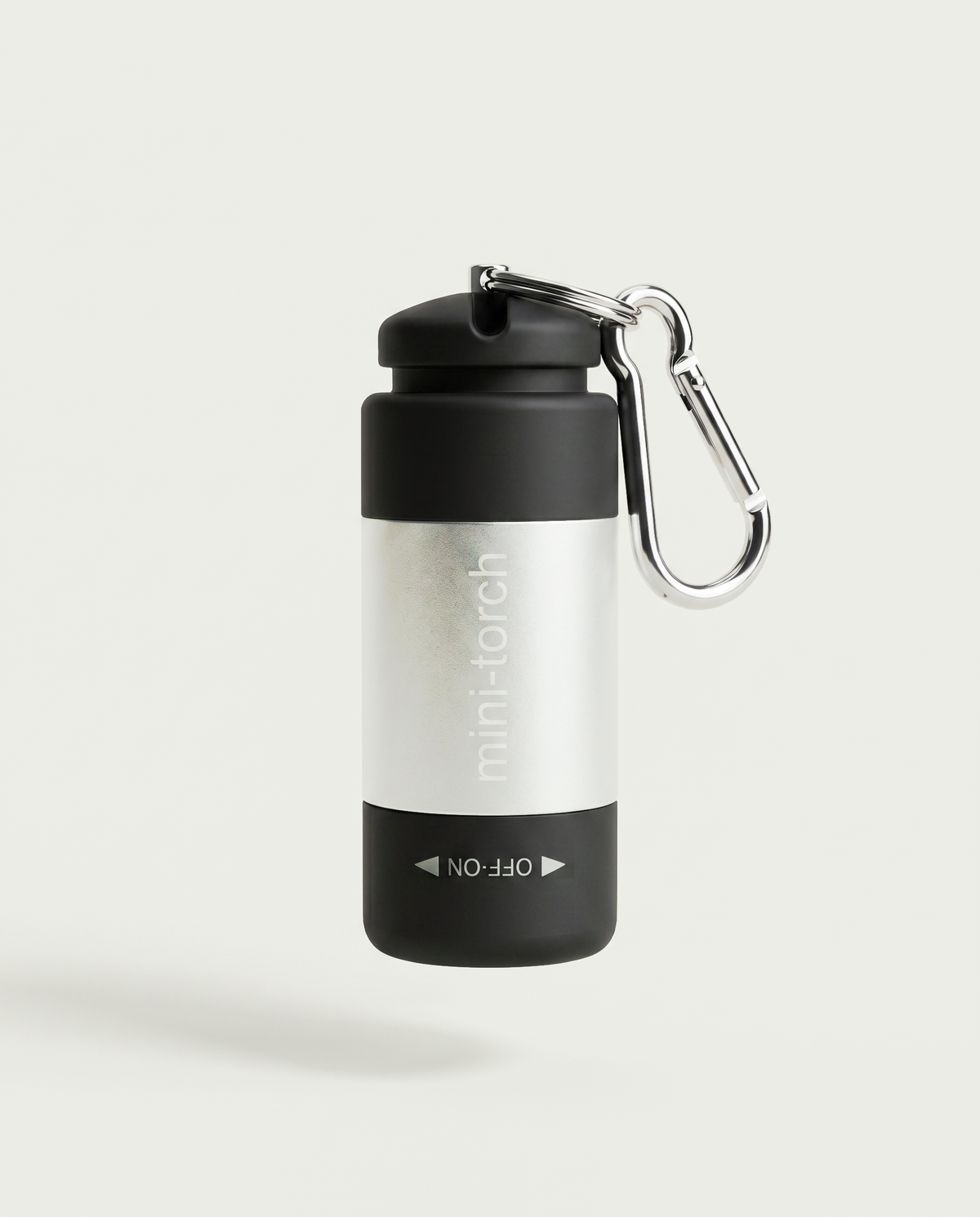 Mini Torche argent — bandeau métallique brossé sur corps noir