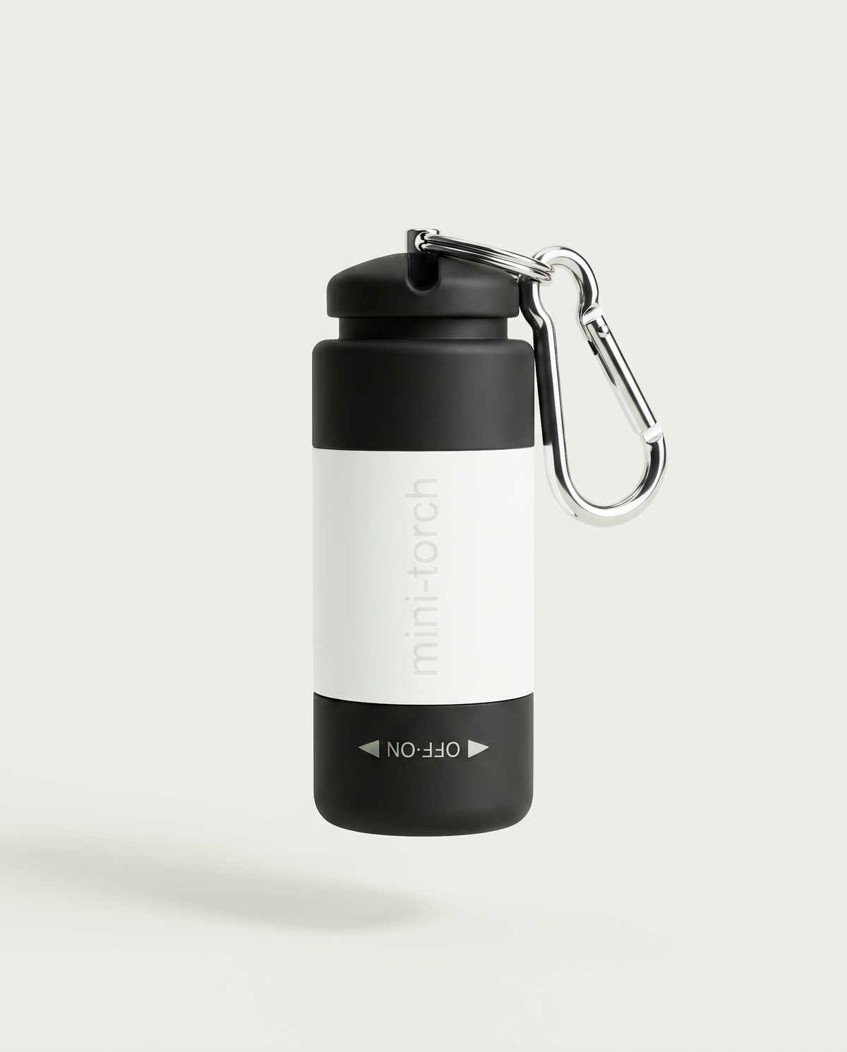 Mini Torche blanche — bandeau blanc sur corps noir, prise USB intégrée